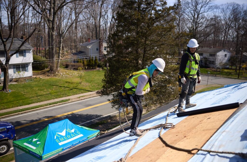 Expert roofer from Emerald Roofing and Siding completing roof installation in Blauvelt, NY to ensure long-lasting protection. Roof Installation near me.