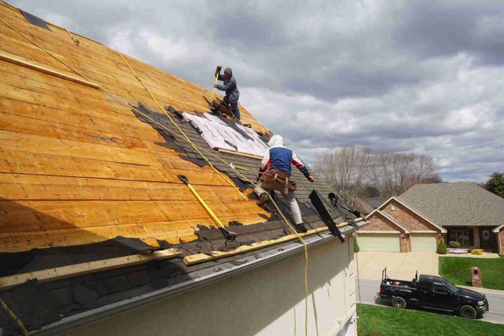 two-emerald-roof-workers-fixing-roof